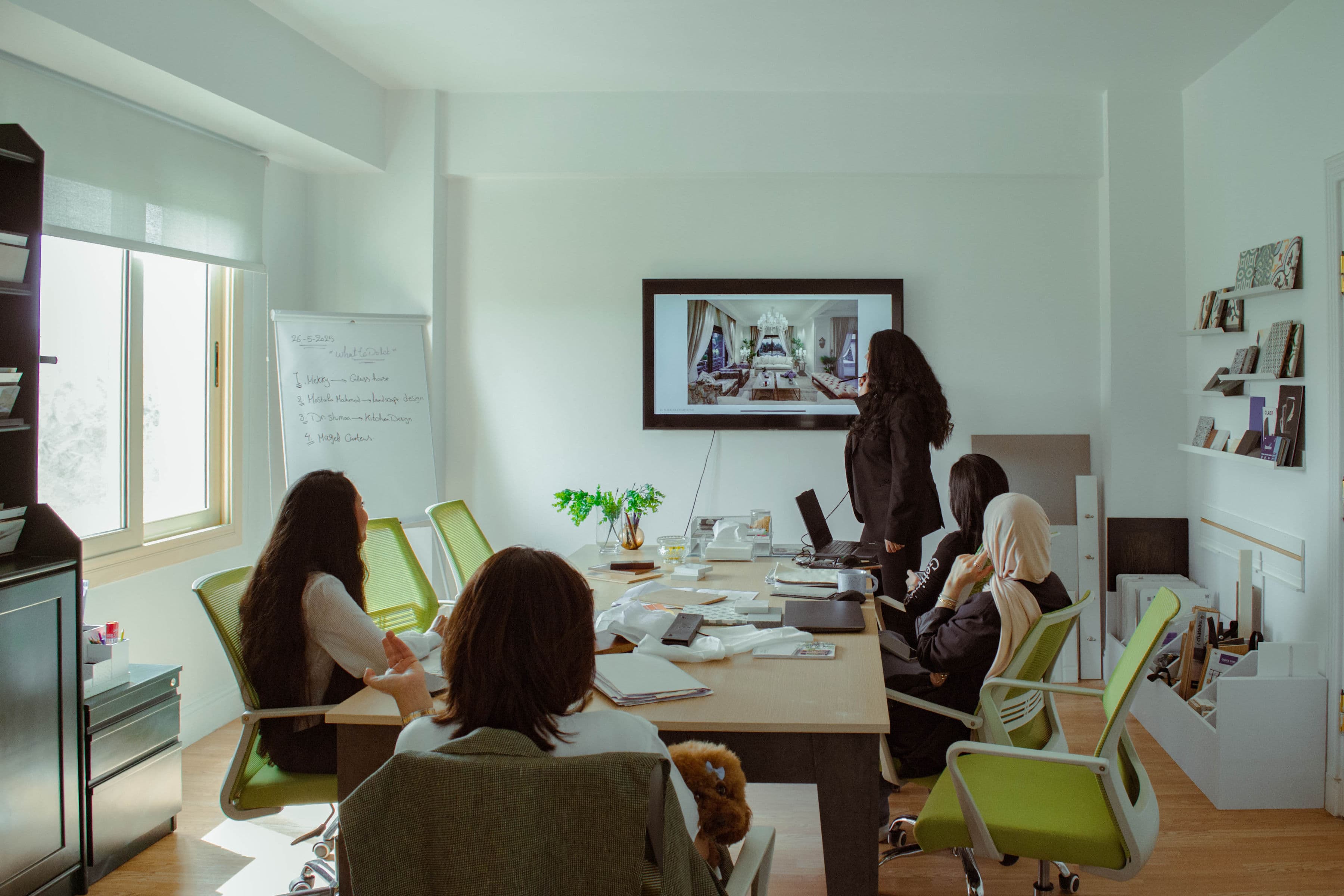 The Home Co. design team collaborating on interior concepts and moodboards in the studio
